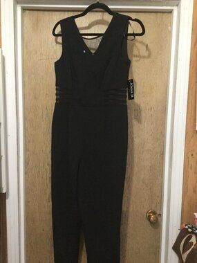 NWT Alexa B Nites Black jumpsuit with sheer panels at neck and waist area size 8